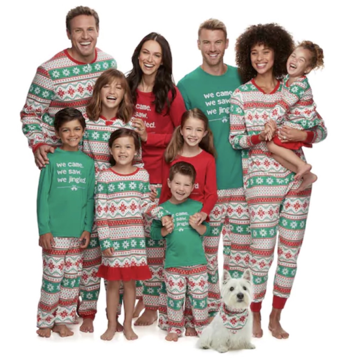 large multiracial family in white, red, and green pajamas
