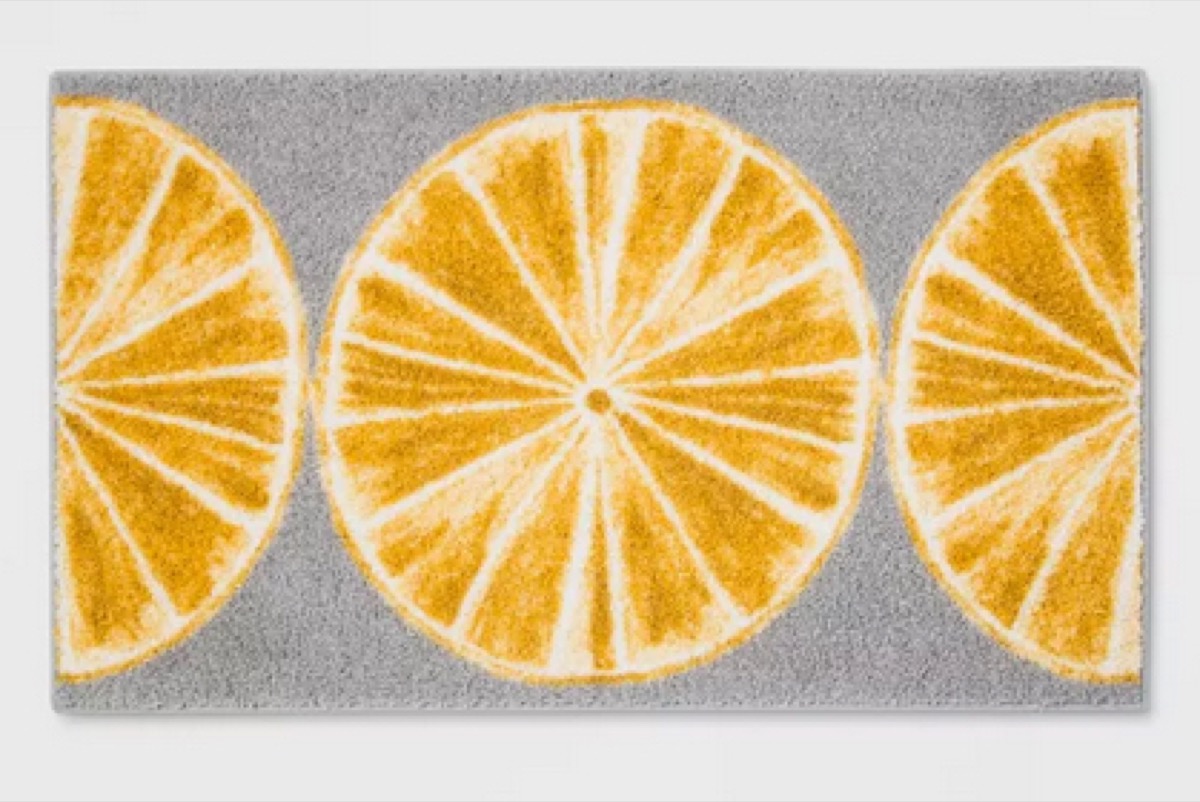 gray rug with orange slices