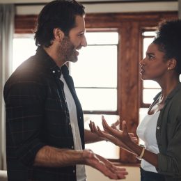Shot of a young couple having an intense argument at home