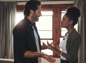 Shot of a young couple having an intense argument at home