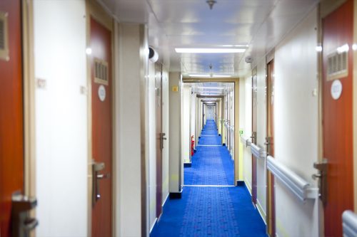 cruise corridor with doors for each cabin