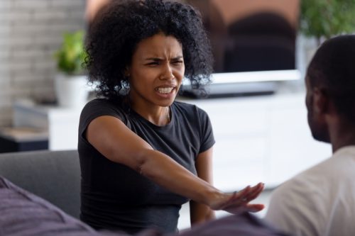 Woman getting defensive during conversation
