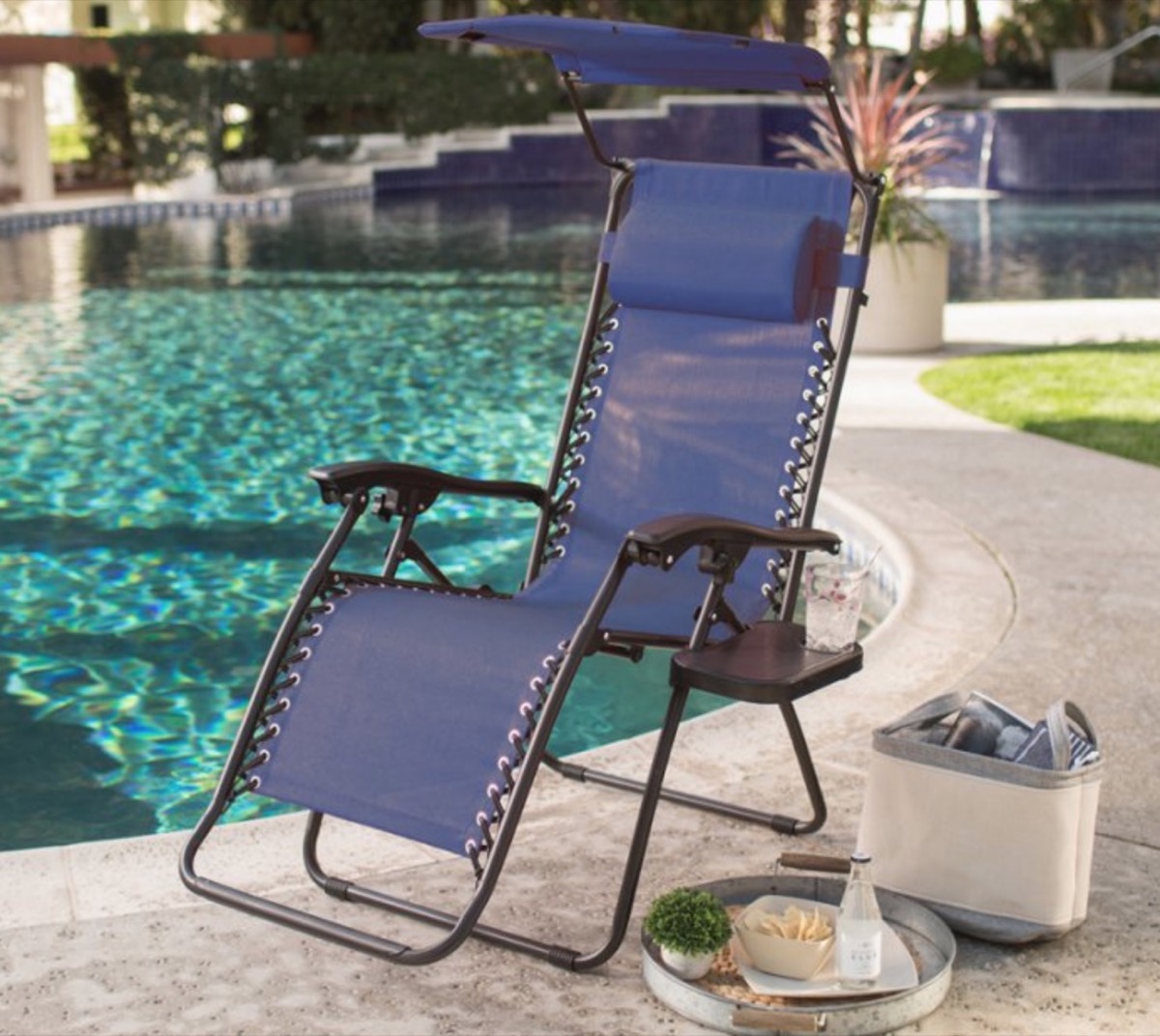 blue reclining chair by pool