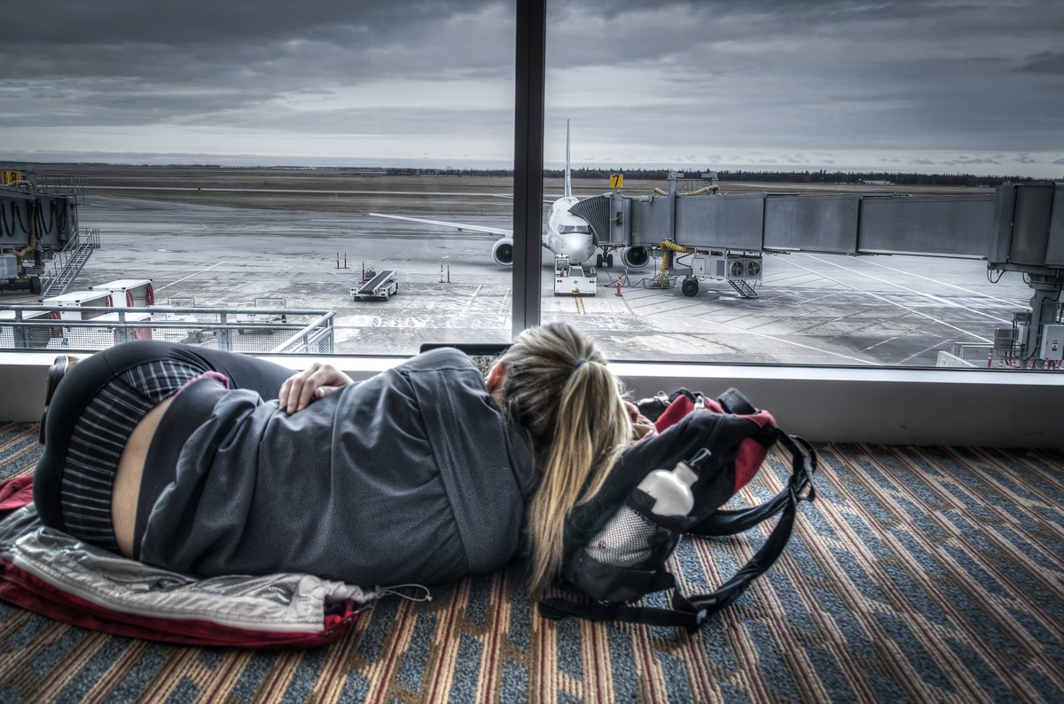 woman tired from layovers