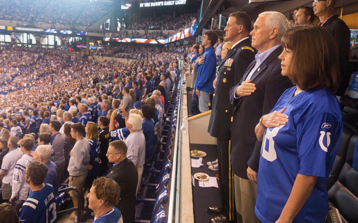 U.S. Vice President Mike Pence, his wife Karen Pence, and Major General Courtney P. Carr stand for the singing of the National Anthem at Lucas Oil Stadium before the start of the Indianapolis Colts game against the San Francisco 49ers Oct. 8, 2017 in Indianapolis, Indiana.
