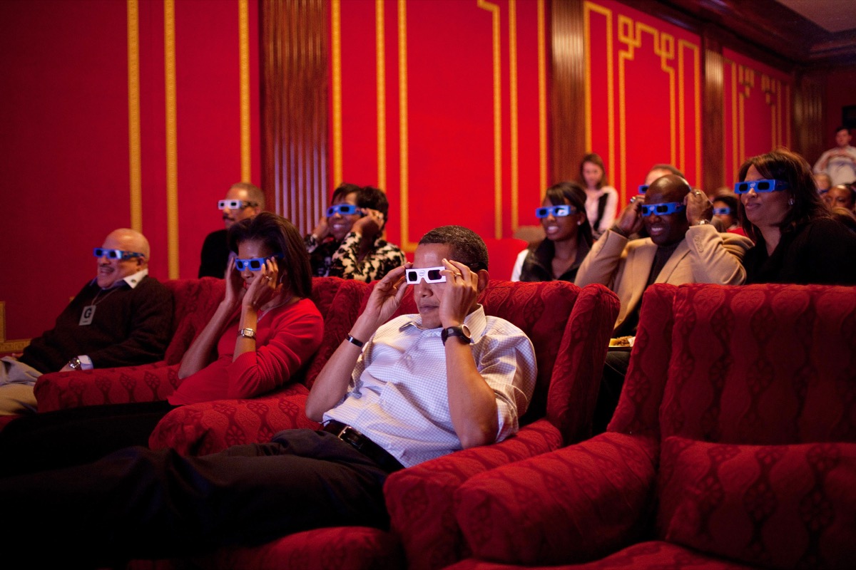 President Barack Obama and First Lady Michelle Obama wear 3-D glasses while watching Super Bowl 43, Arizona Cardinals vs. Pittsburgh Steelers, at a Super Bowl Party in the family theater of the White House. Guests included family, friends, staff members and bipartisan members of Congress.