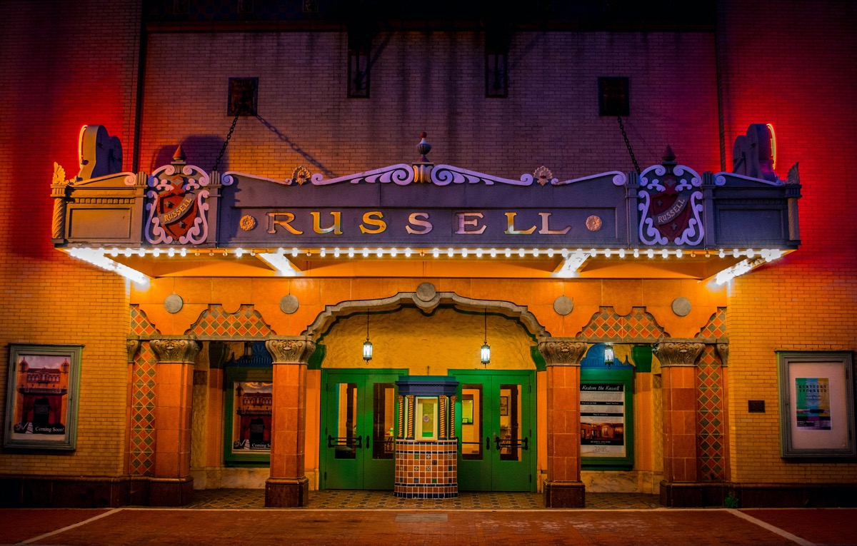 historic theater lit up at night