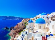 the famous blue-roof houses on santorini island greece