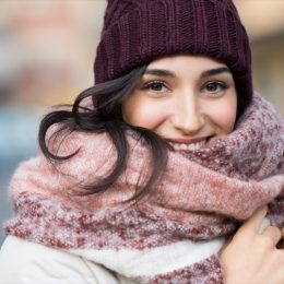 Woman in hat and scarf