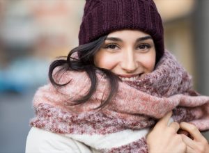 Woman in hat and scarf