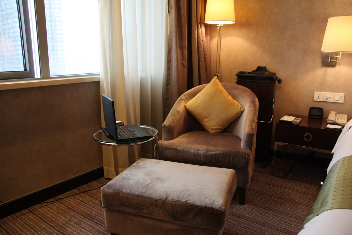 hotel room armchair couch with leg rest
