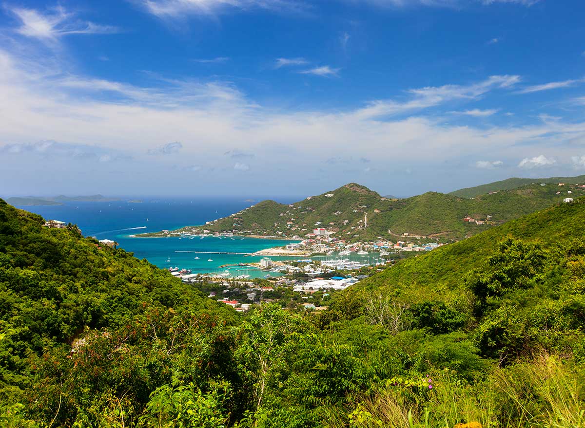 a panoramic view of the harbor and mountains in the british virgin islands