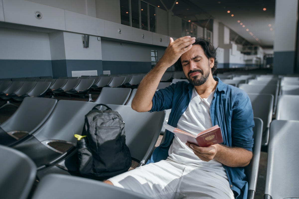 man frustrated for wrong flight details