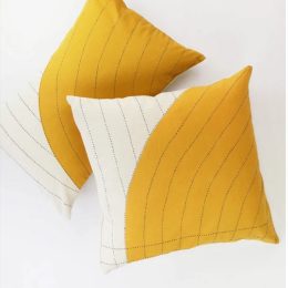 yellow and white pillows