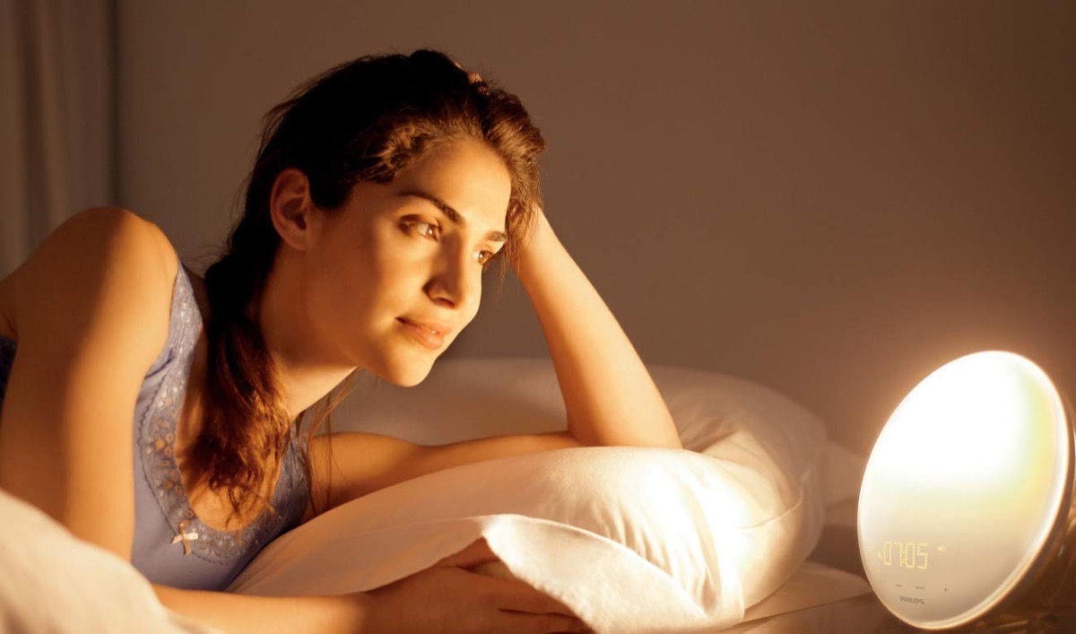 woman looking at wake-up light