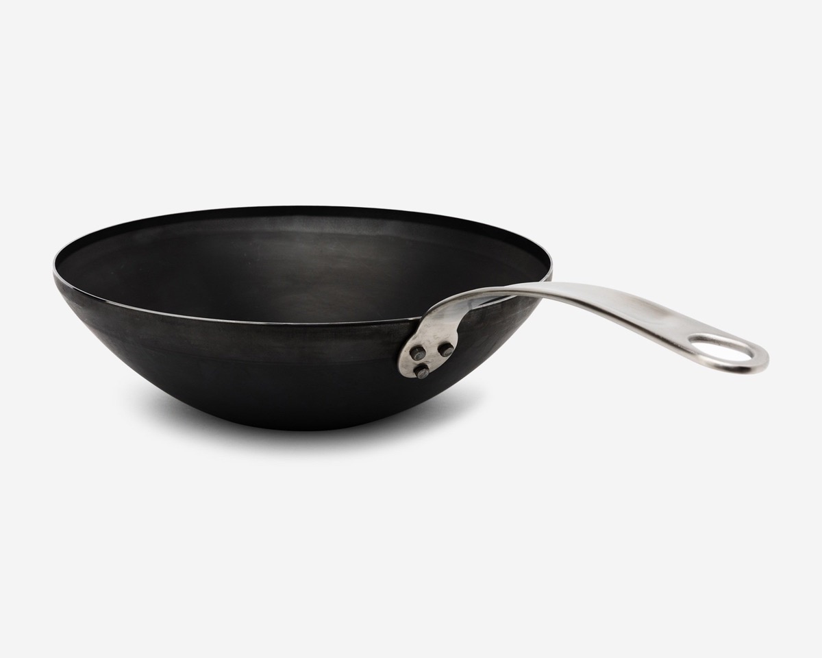 black wok with silver handle