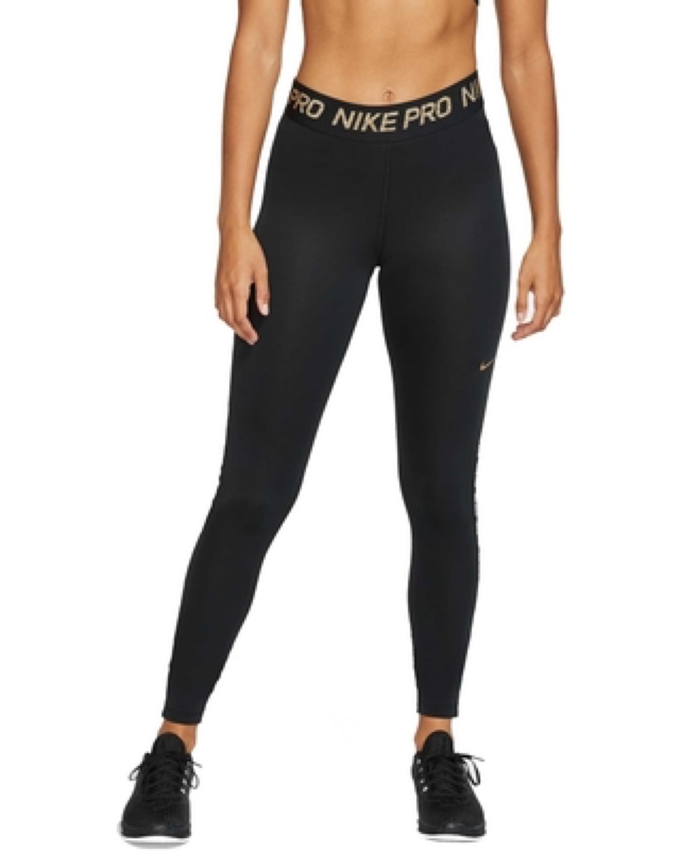 Fit woman wearing Nike branded running pants