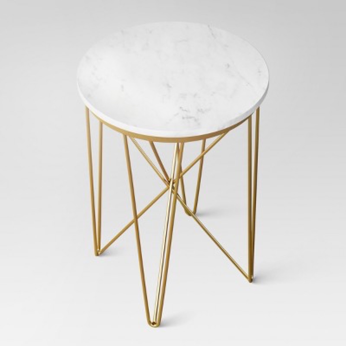 marble topped table with gold lets