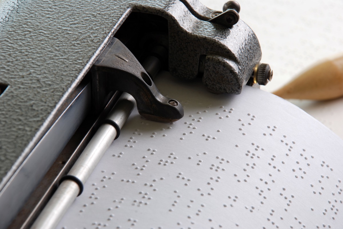 braille reading being printed