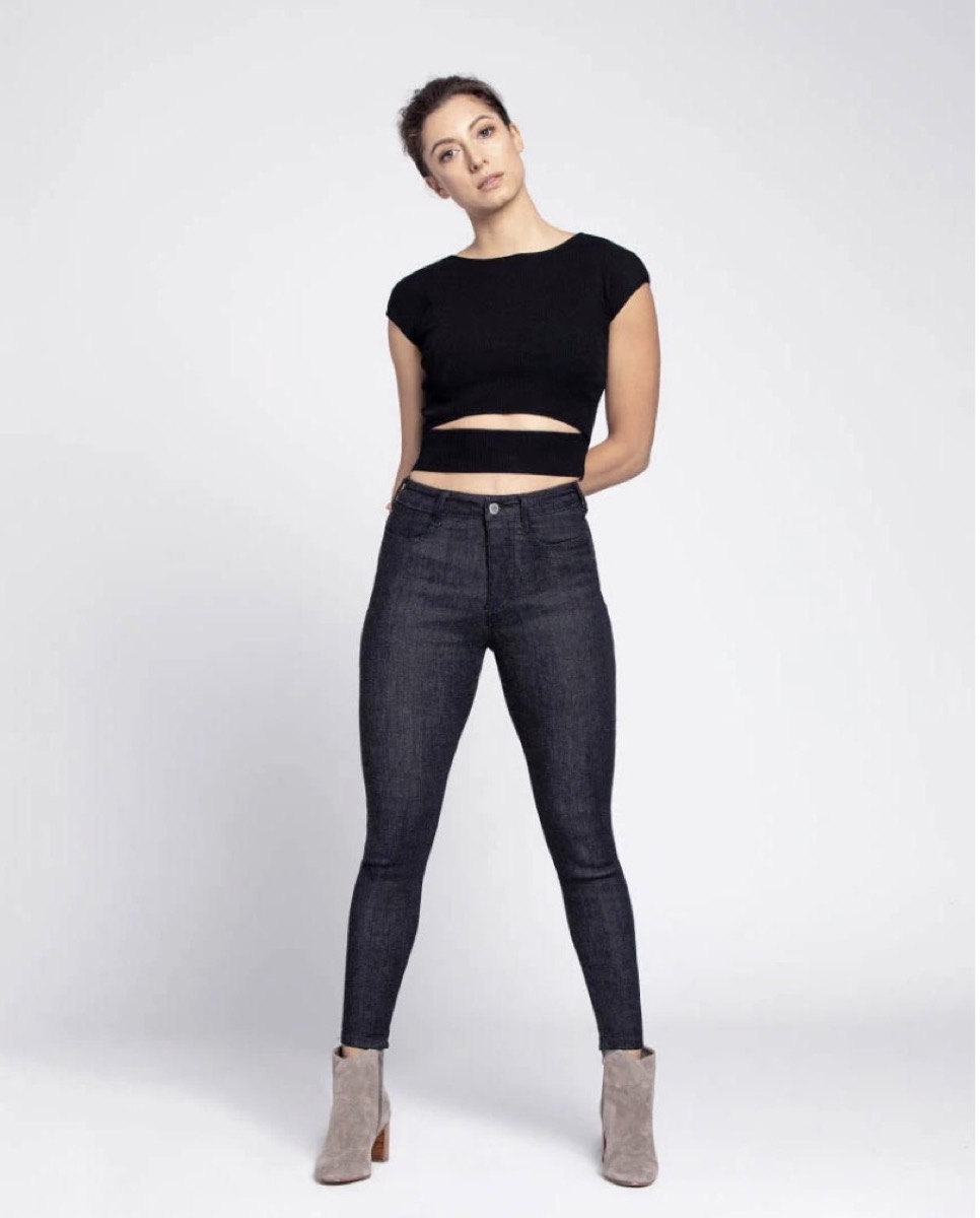 woman in jeans and black top