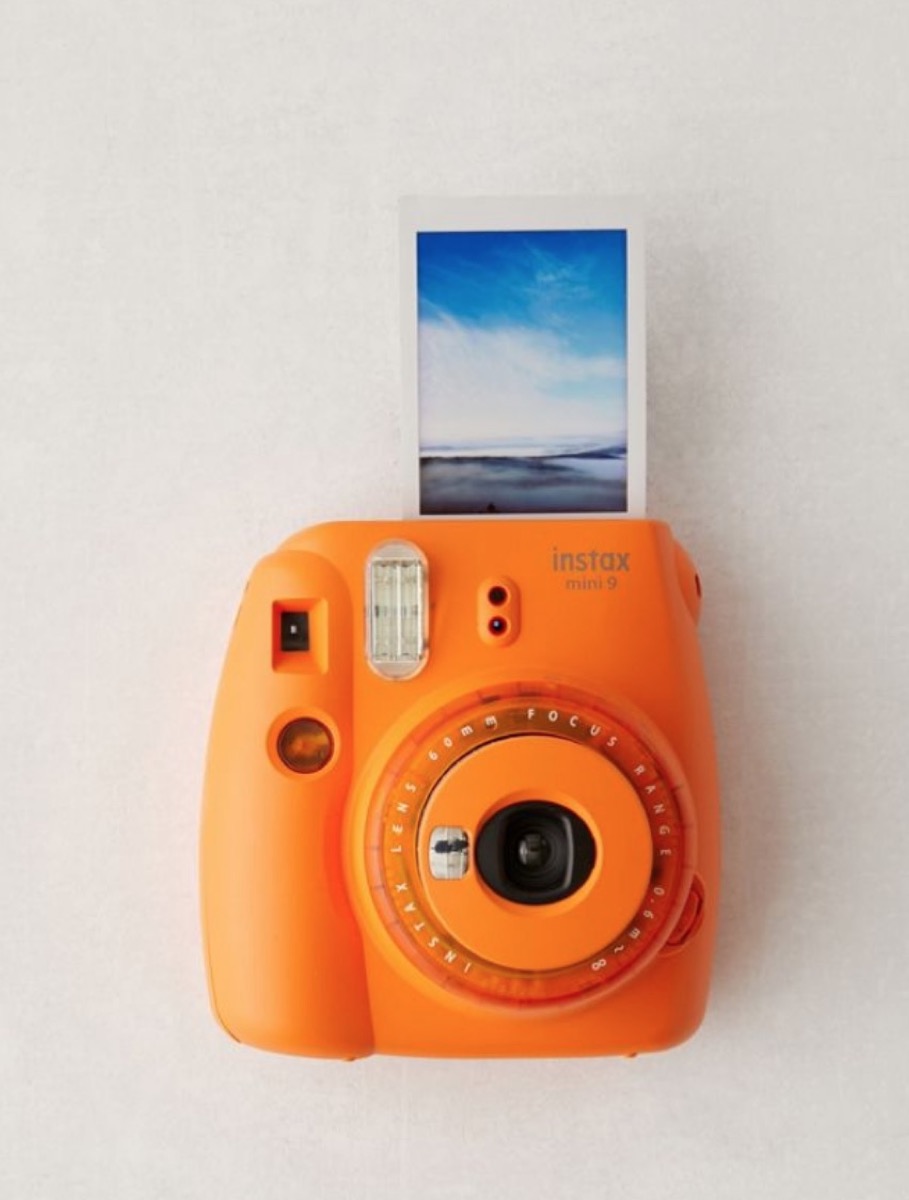 orange fujifilm instax instant camera