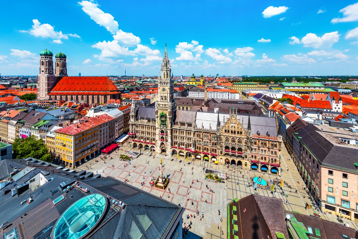 Scenic summer aerial view of the ancient medieval gothic architecture City Hall building at the Marienplatz Market Square in Munich, Bavaria, Germany.