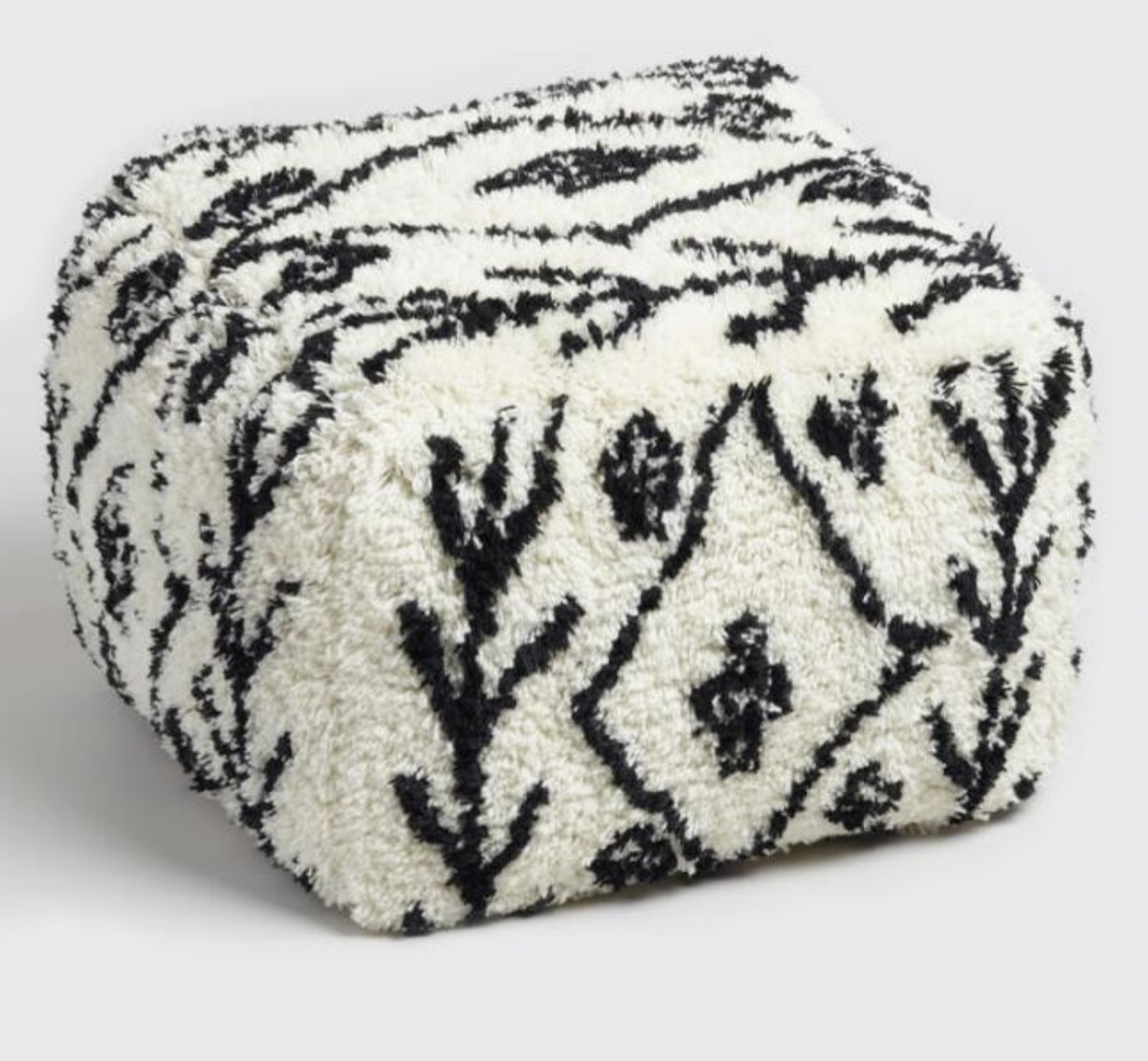 black and white shaggy wool pouf from World Market
