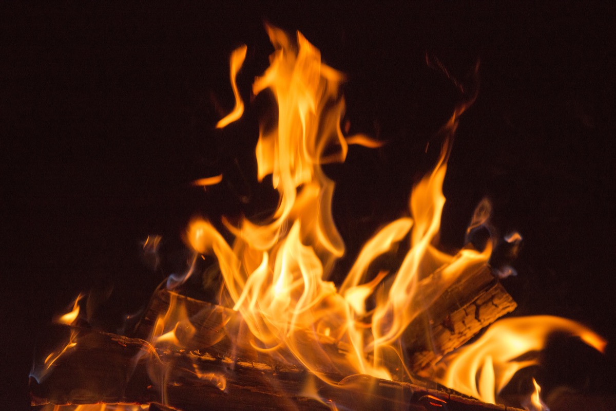 flaming bonfire and embers.