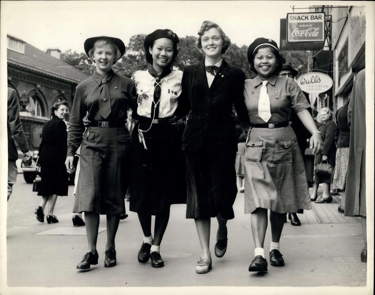 diverse group of girl scouts in the 1950s