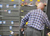 people helping elderly shopping