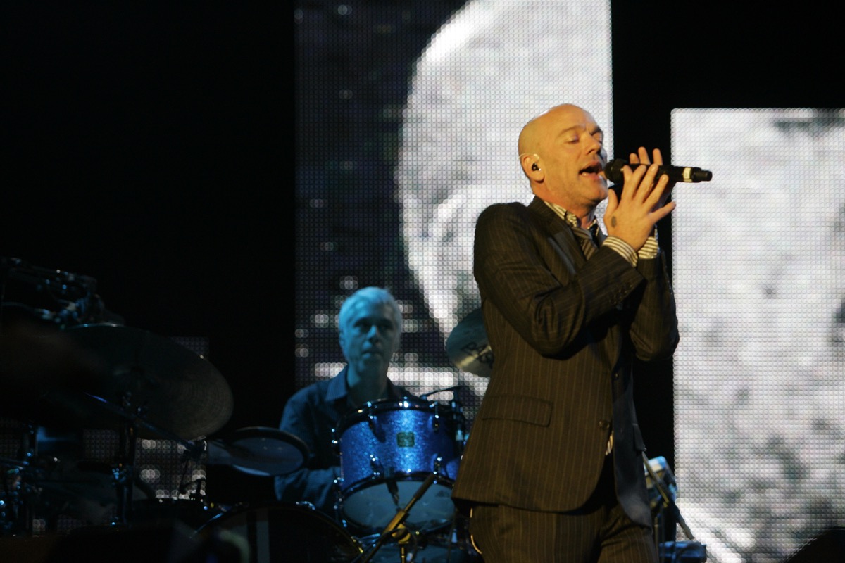 lead singer Michael stripe of rem band performing