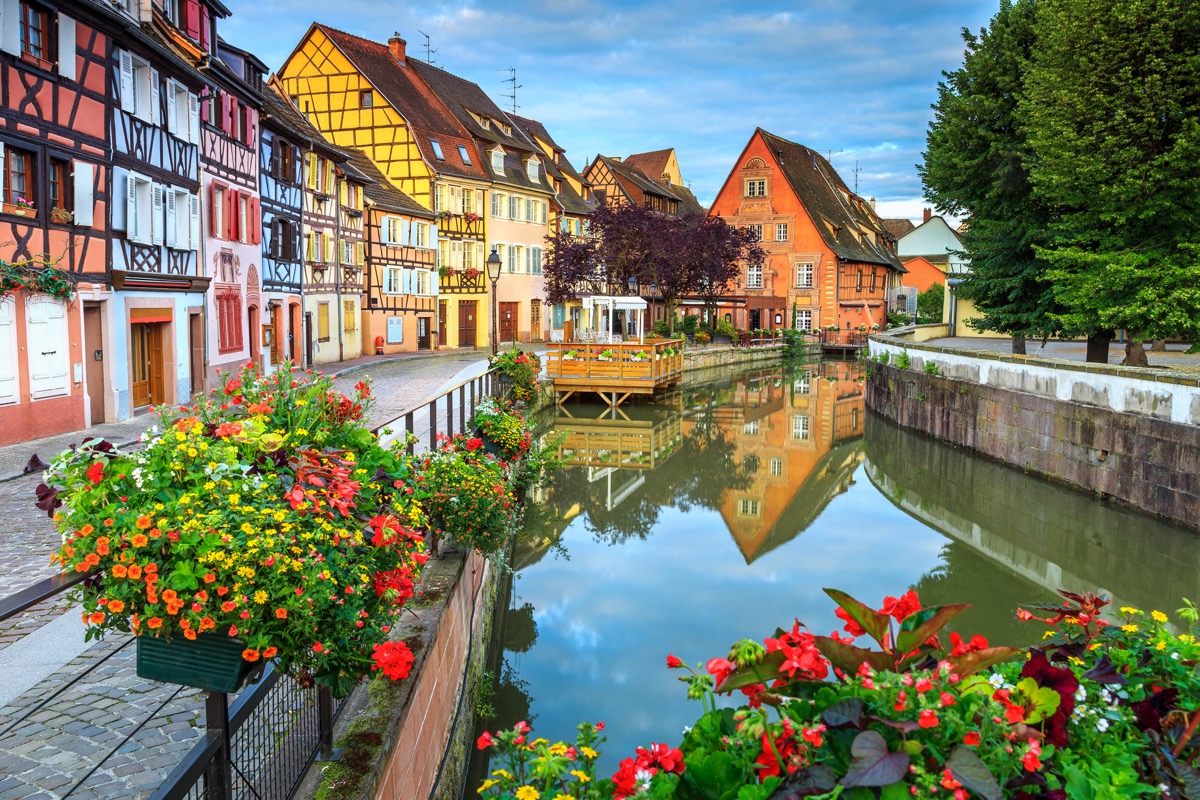 Spectacular colorful traditional french houses on the side of river Lauch in Petite Venise