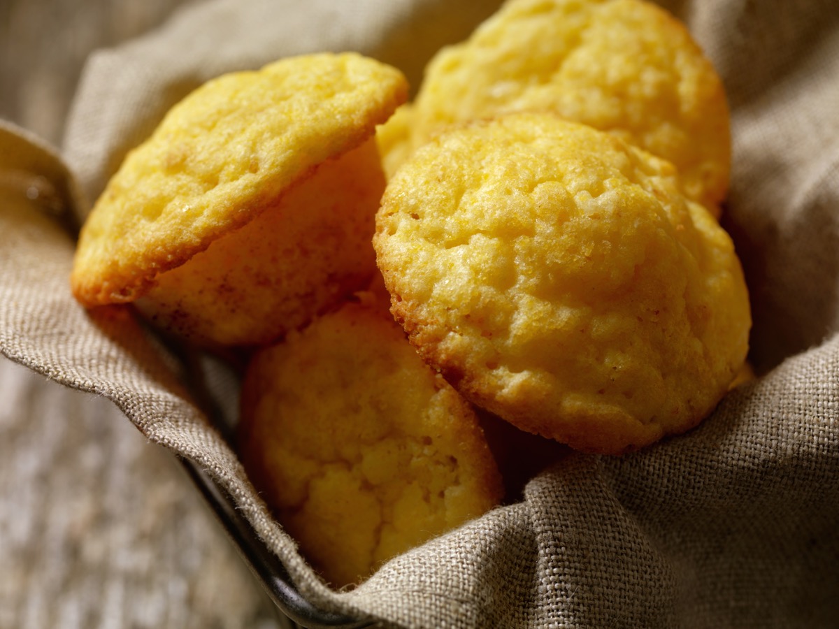 basket of corn muffins on the table