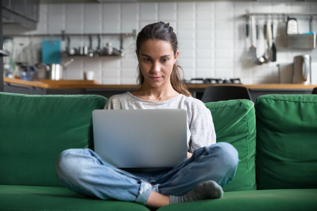 Woman on the couch with her laptop