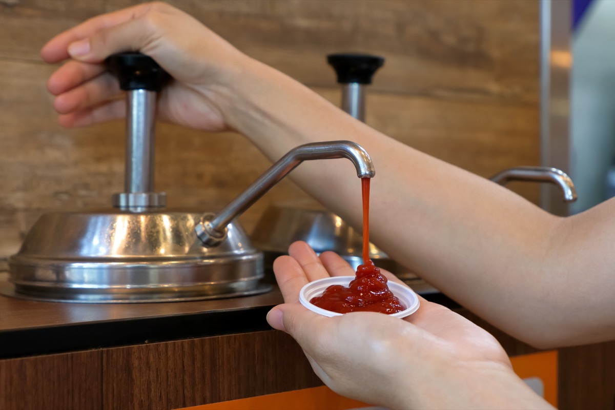 woman pumping ketchup
