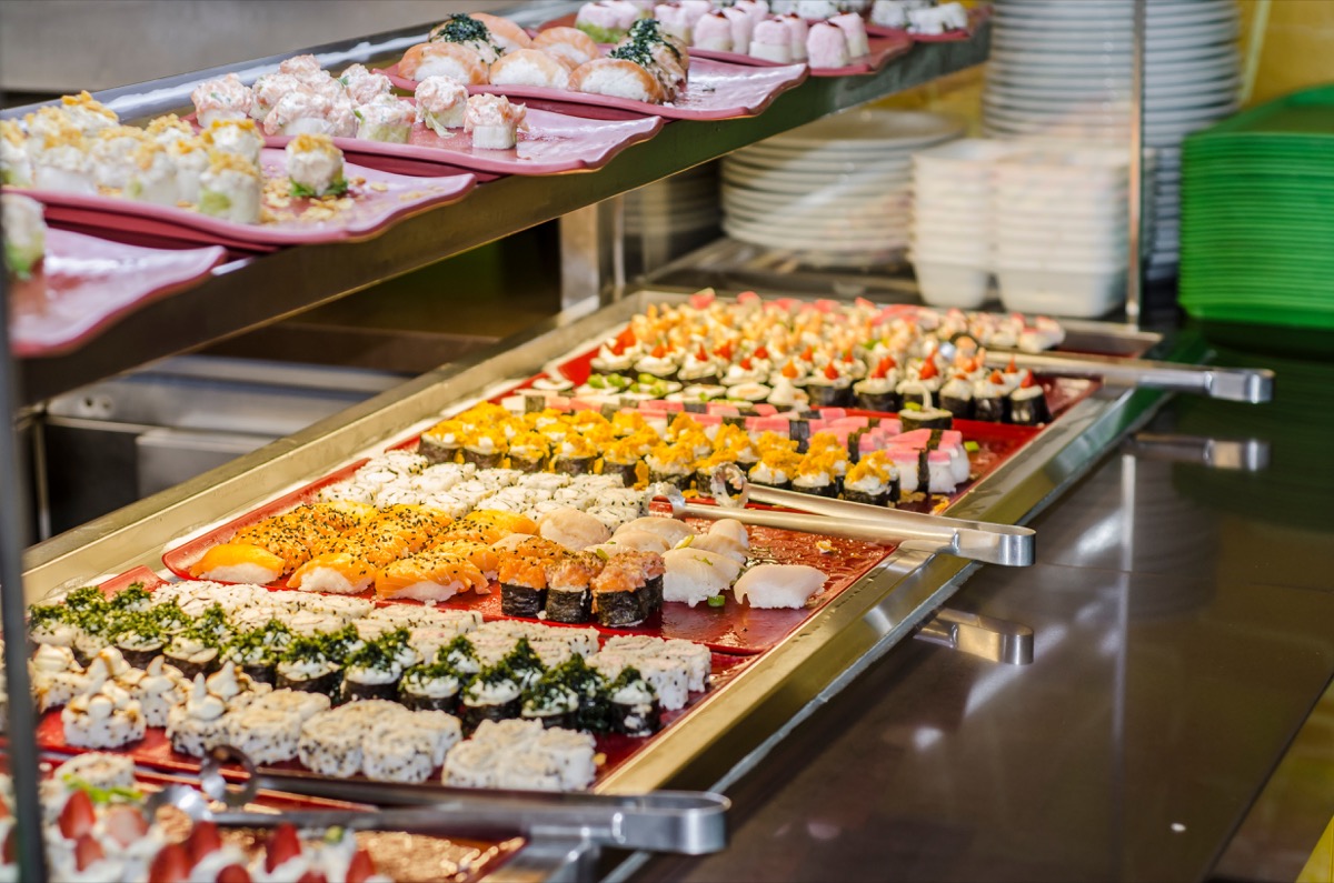 buffet style display of sushi rolls