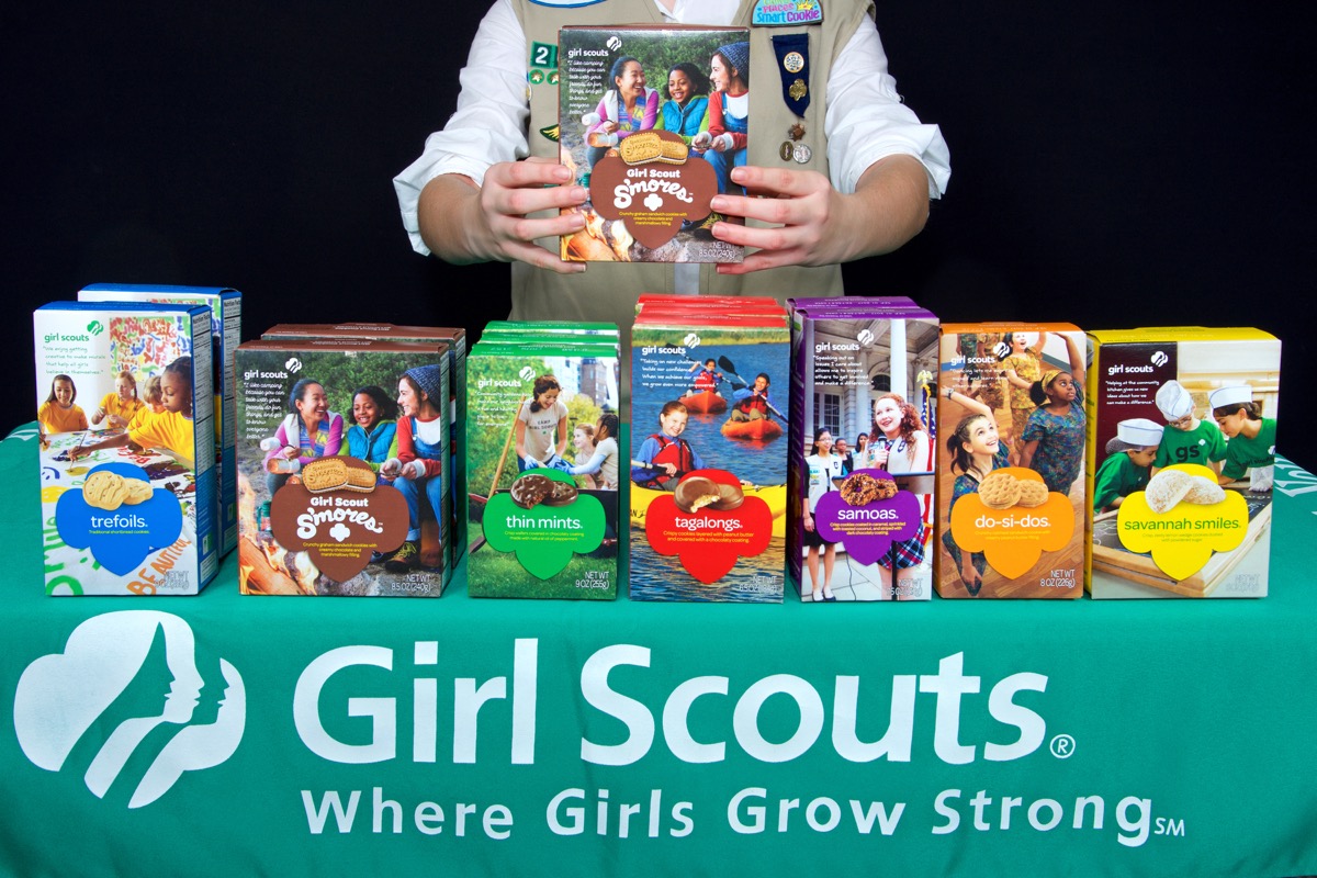 table full of girl scout cookies