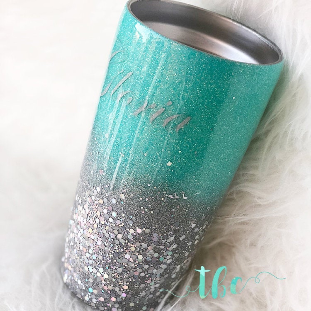 insulated tumbler with silver name, teal top and glittery silver bottom