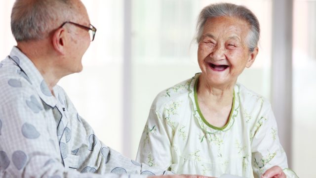 Older couple happy talking
