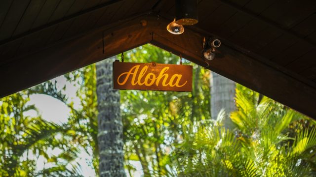 aloha Hawaii sign on top of a building