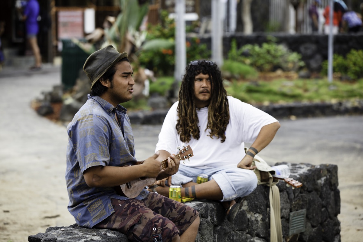 Hawaiian men playing ukulele 