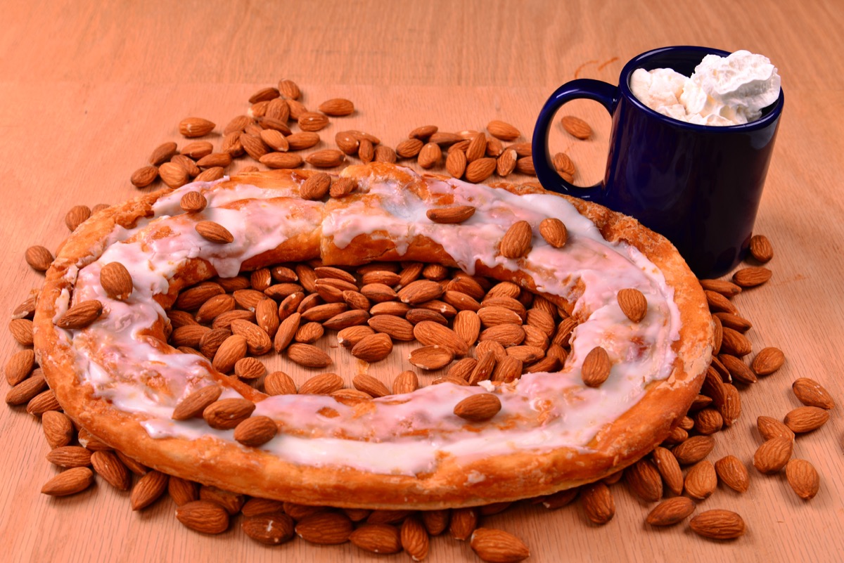 kringle pastry surrounded by almonds
