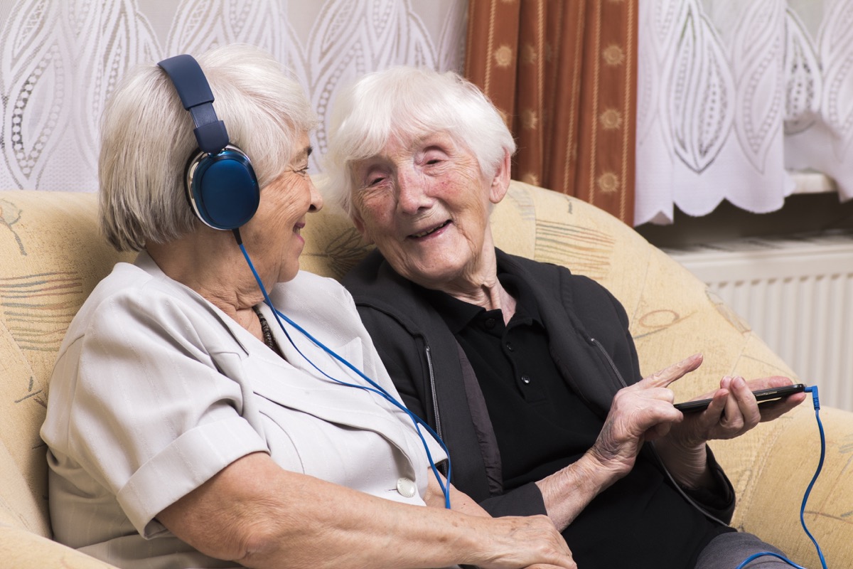 Old friends listening to music and chatting together