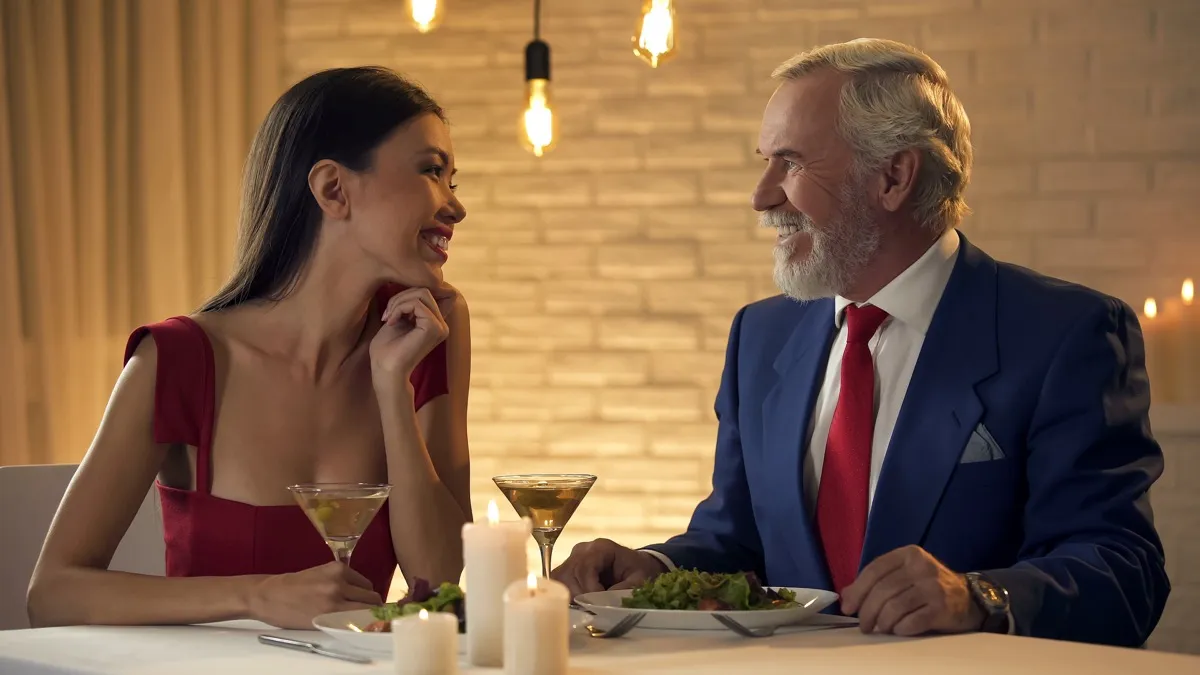 Older man on a date with a younger woman