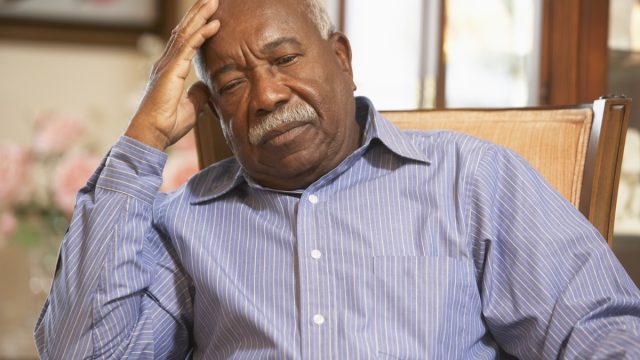 Older man looking exhausted