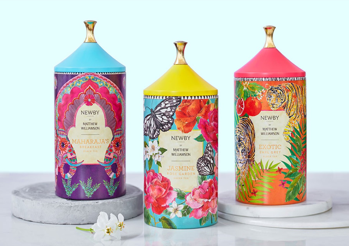 three floral-patterned tea canisters