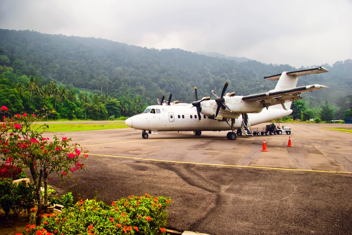 tioman airport with a charter plane on the runway