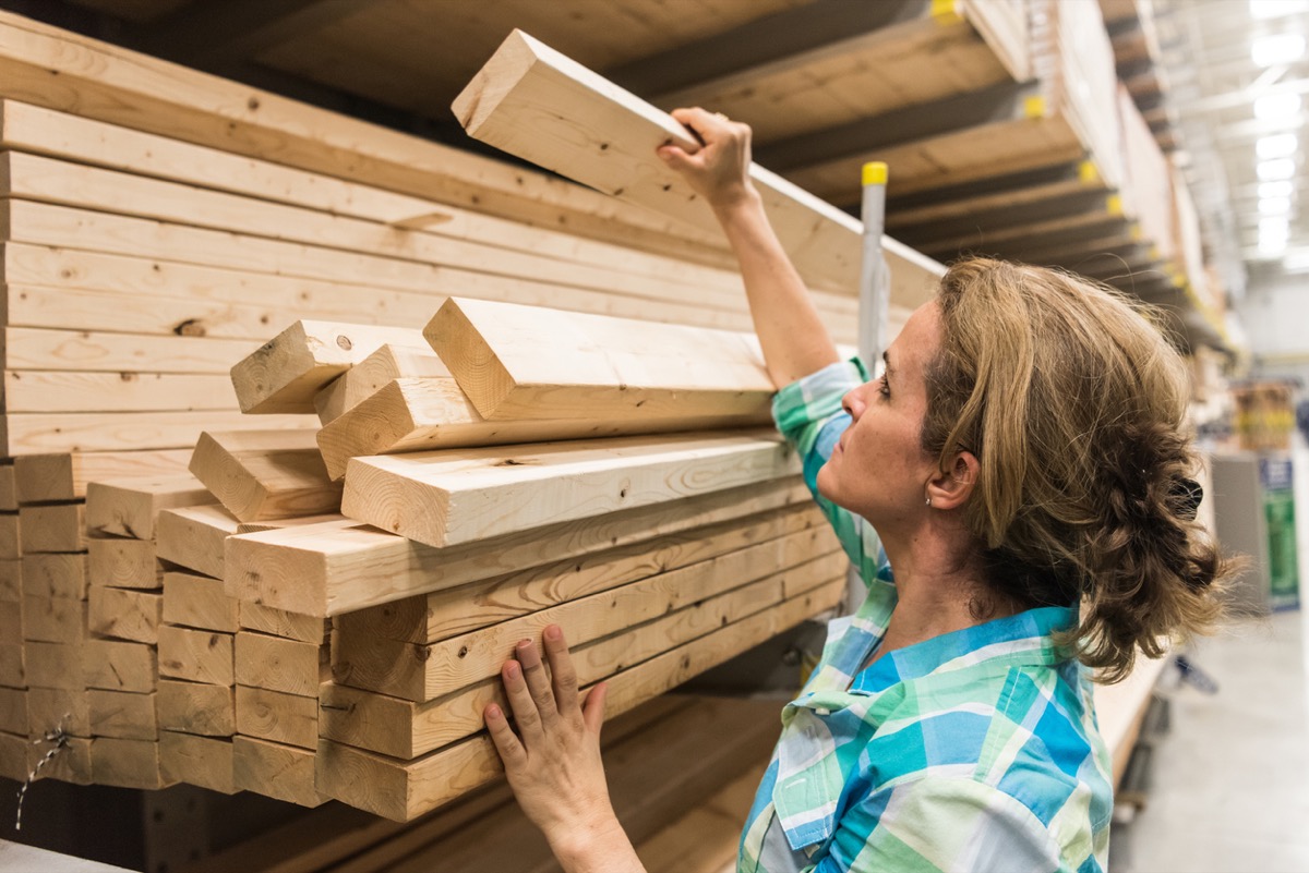 woman shopping for timber/lumber