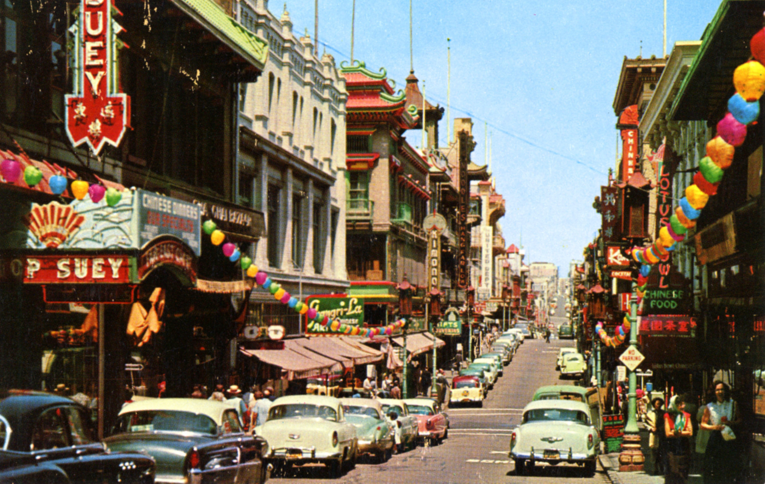 cars line the streets of Chinatown in San Francisco in 1957