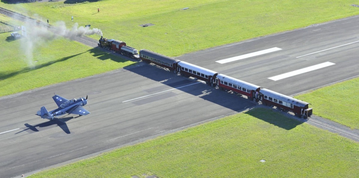 train crossing an airplane runway
